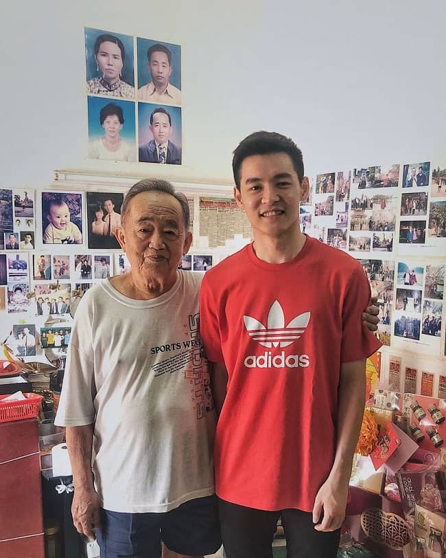 Cheam June Wei with his father
